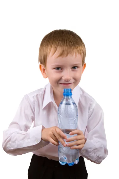Happy boy with a bottle of water — Stock Photo, Image