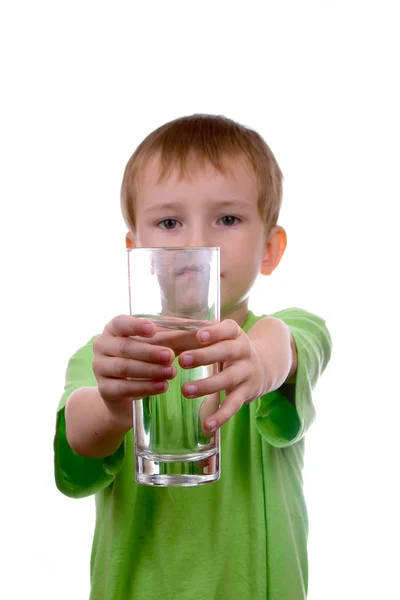 stock image Boy holds a glass of water