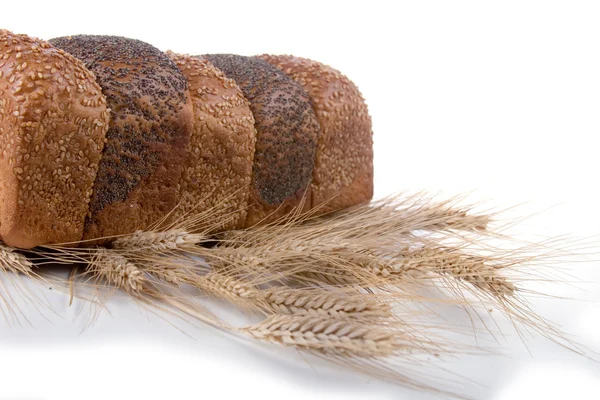Fresh bread with ears of wheat — Stock Photo, Image