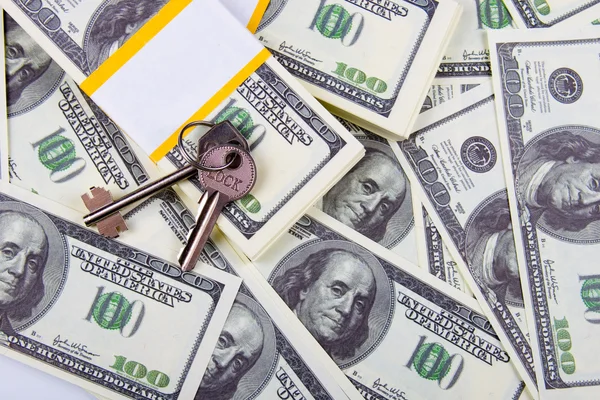 Keys of one hundred dollar bills background — Stock Photo, Image