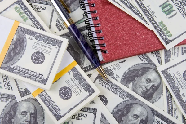 Δολάρια, σημειωματάριο και στυλό, χρήματα φόντο — Φωτογραφία Αρχείου