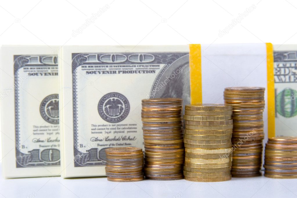 Stack of coins and dollars
