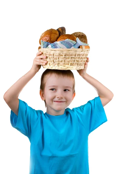 Boy with a basket of bread — Stock Photo, Image