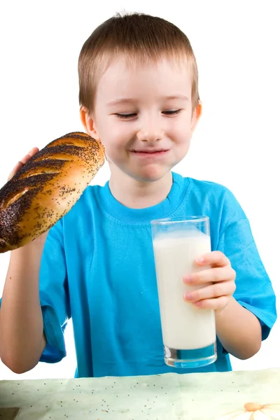 Boy with a bread and milk — Stock Photo, Image
