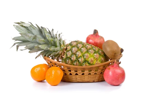 Fresh fruits in a wicker basket — Stock Photo, Image
