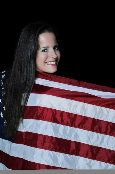 Kvinnan insvept i en flagga — Stockfoto