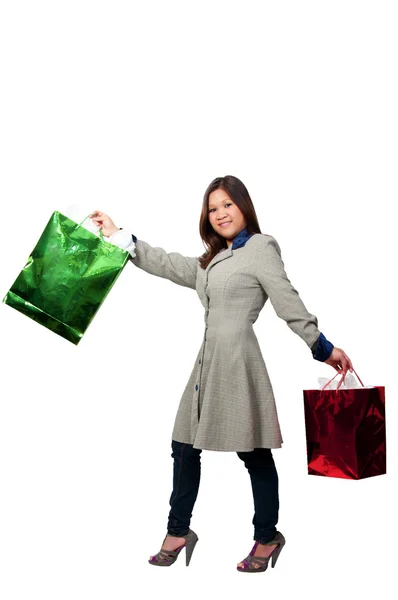 Hispánský žena s nákupní tašky — Stock fotografie