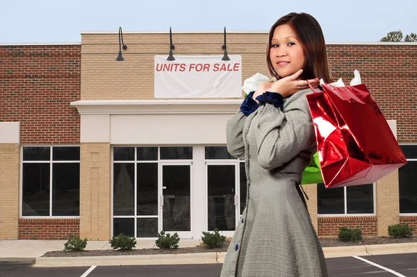 Hispanic Woman with Shopping Bags — Stock Photo, Image