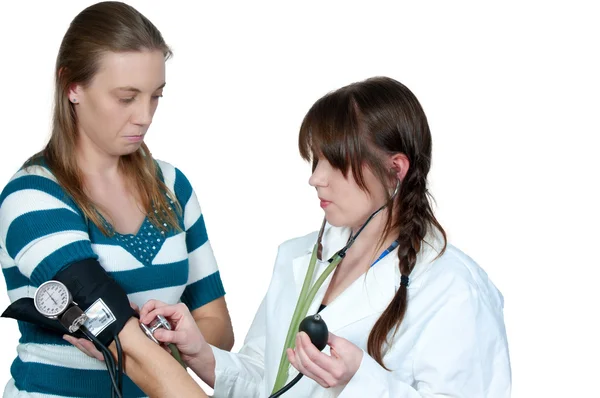 Vrouw arts patiënten bloeddruk — Stockfoto