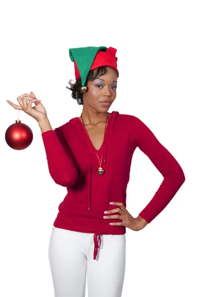 Mulher negra segurando um ornamento de Natal — Fotografia de Stock
