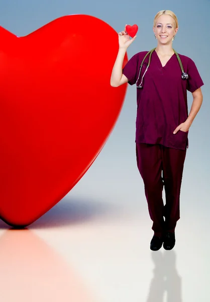 Female Doctor Woman Cardiologist Holding Red Heart — Stock Photo, Image