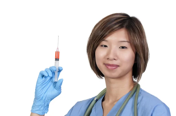 Médico fêmea com seringa — Fotografia de Stock