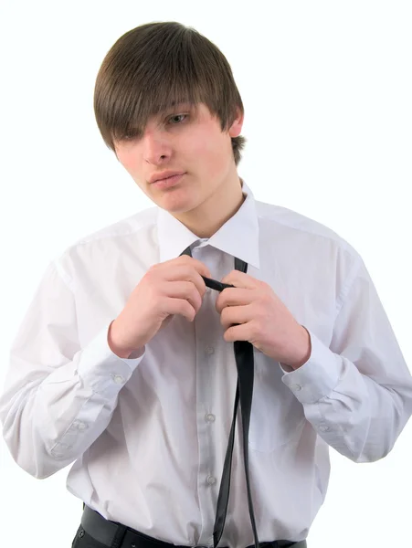 Όμορφος νεαρός άνδρας και γραβάτα. στούντιο πυροβολήσει πάνω από το λευκό φόντο — Φωτογραφία Αρχείου
