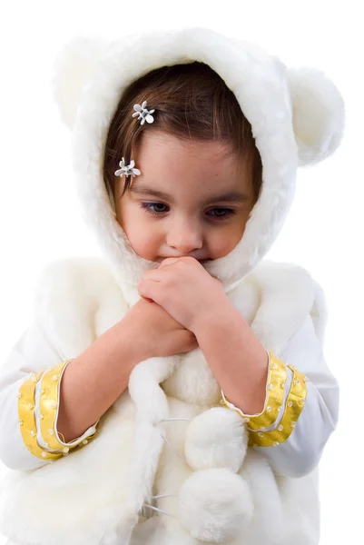 Portrét smutný holčička v bílé kožešiny. Studio pro natáčení nad Svatodušní — Stock fotografie