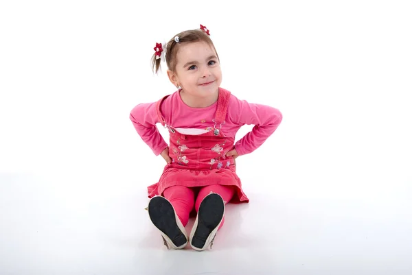 Zittend Meisje Roze Studio Schieten Witte Achtergrond — Stockfoto
