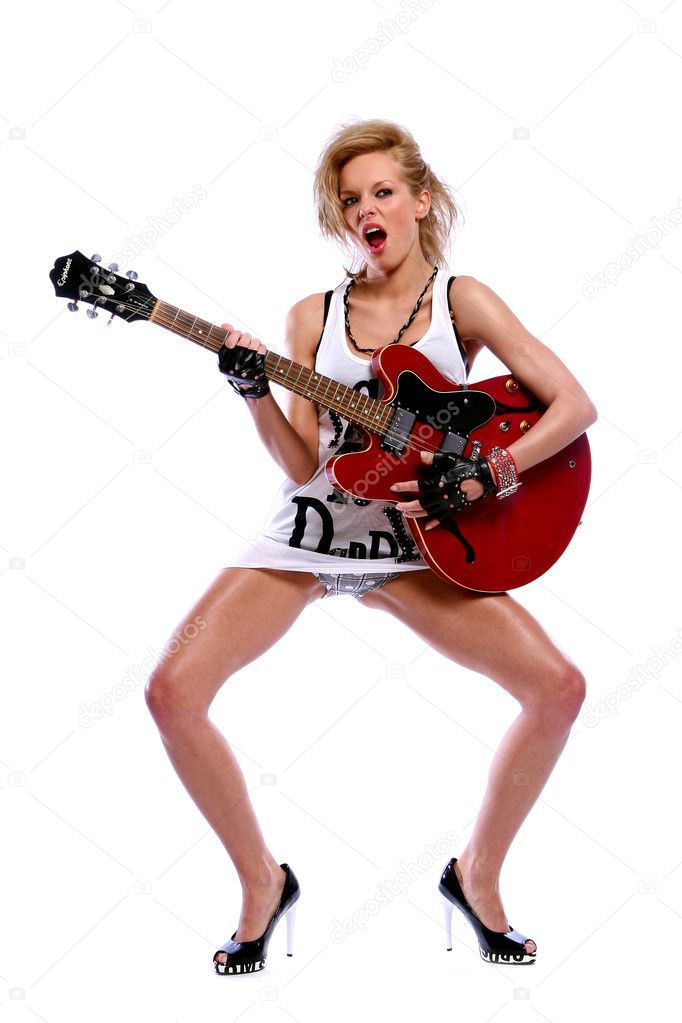 Sexy young woman with red guitar - Stock Photo © yekophotostudio #4302648