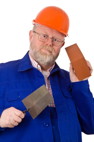 Mason with trowel and brick — Stock Photo, Image