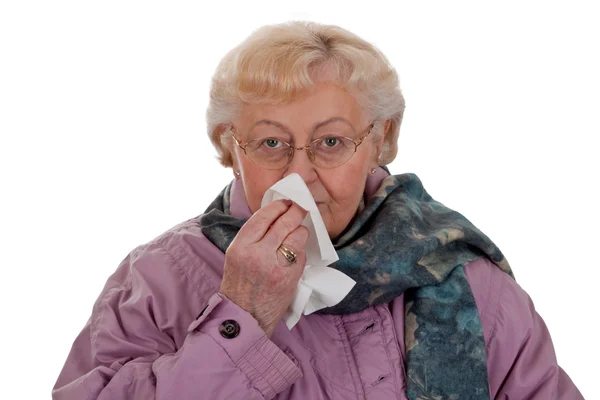 Elderly Woman Blowing Her Nose Isolated — Stock Photo, Image