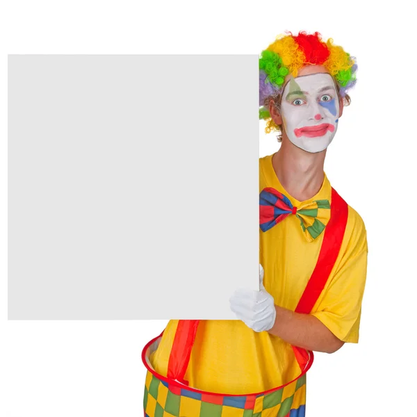Клоун с рекламным щитом — стоковое фото