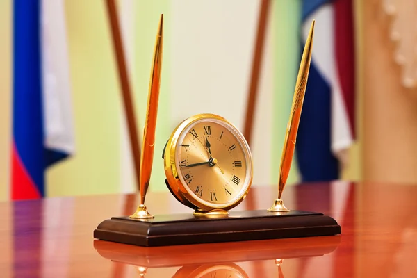 stock image Inkstand with clock on manager table somewhere in Russia