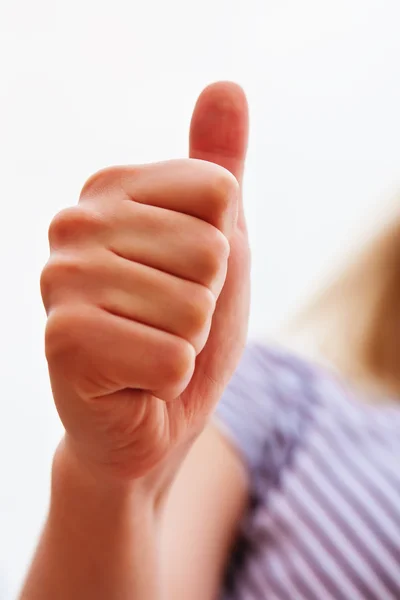 stock image Closeup of thumb's up sign (female hand)