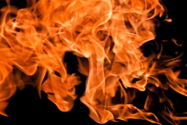 Eld lågor att höja hög — Stockfoto