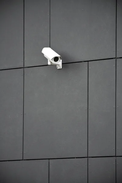 Security camera and office building — Stock Photo, Image