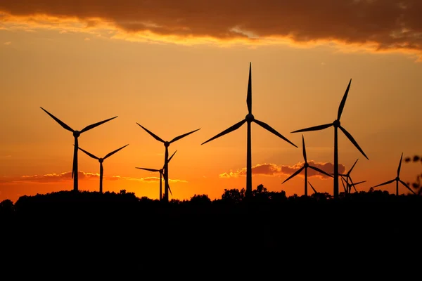 Stock image Silhouette of wind power station