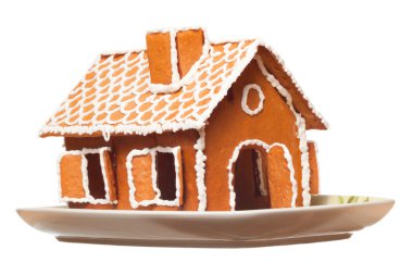 Isolated christmas gingernut house on vessel, white isolated background clipart