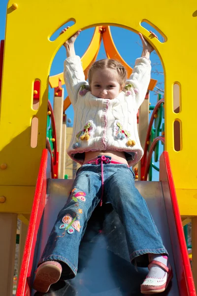 Chica en el parque infantil — Foto de Stock