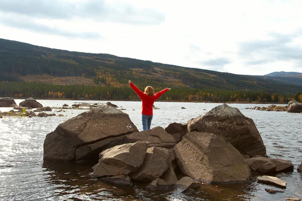 stock image Girl on a river bank 2