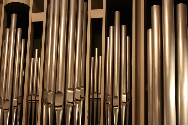 stock image Several organ-pipes at the twilight reed organ hall