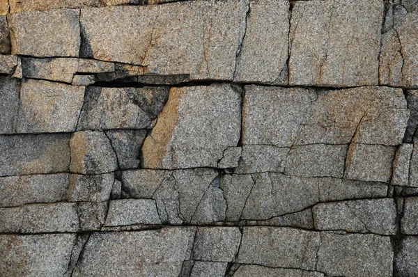 Textura de superfície de granito profundamente rachado — Fotografia de Stock
