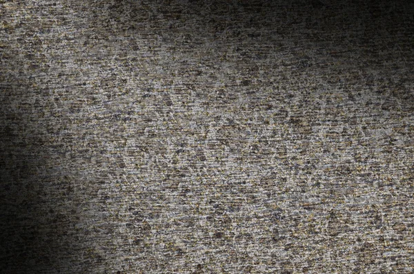 Closeup de textura de rocha cinza iluminado diagonalmente — Fotografia de Stock