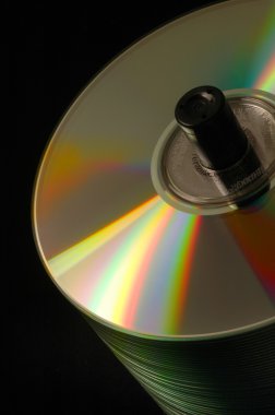 Close-up of a stack of CD/DVD disks clipart