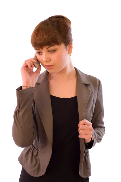 Giovane donna d'affari che parla intensamente al telefono — Foto Stock