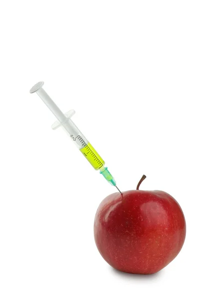GMO: apple being mutated into the orange after injection of unknown green l — Stock Photo, Image