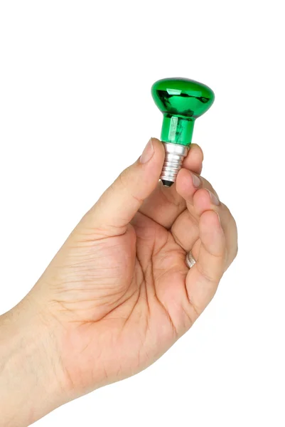 Hand hold tiny green spot tungsten lightbulb — Stock Photo, Image