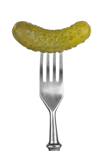 Marinated cornichon on the fork — Stock Photo, Image