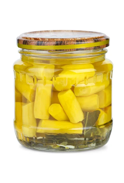 Glass jar with marinated courgette slices — Stock Photo, Image