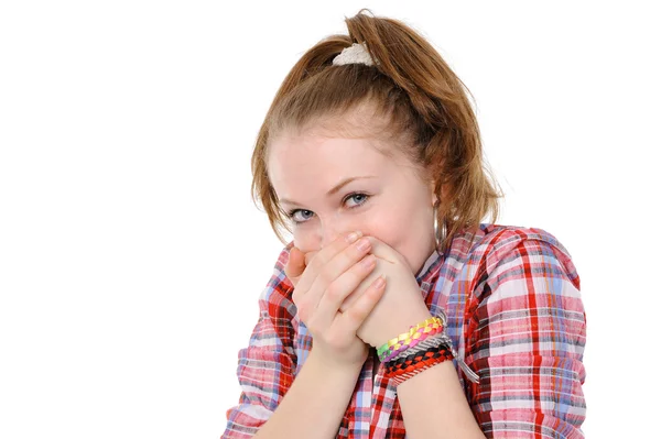 Teenage girl with hand over mouth — Stock Photo, Image
