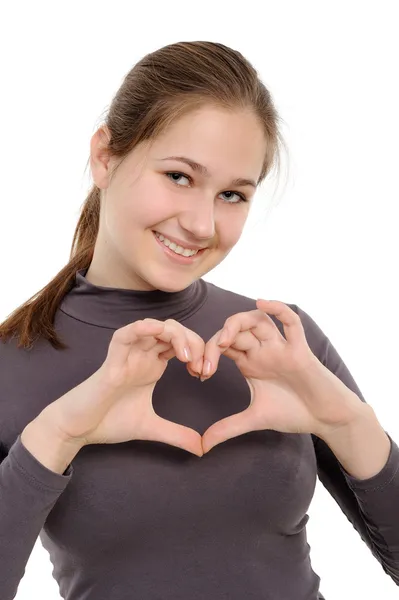 "kalp" parmakları ile gösterilen genç kız. — Stok fotoğraf
