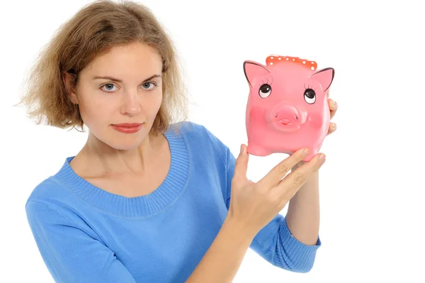 Kvinna med en piggybank — Stockfoto