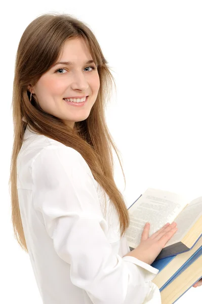 Девушка с длинными волосами и книга — стоковое фото