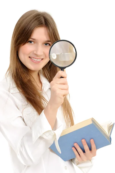 Businesswoman using magnifying glass — Stock Photo, Image