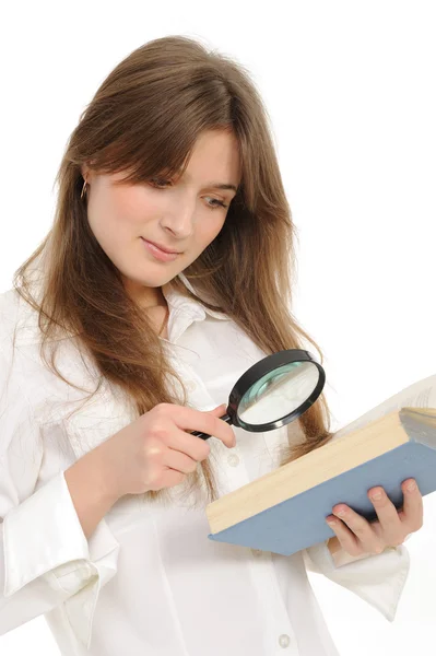 Woman looking papers with magnifying glass — Stock Photo, Image