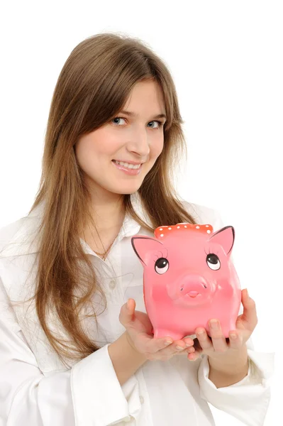 Woman with a piggybank — Stock Photo, Image