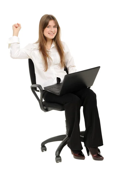 Donna eccitata con computer portatile godendo di successo — Foto Stock