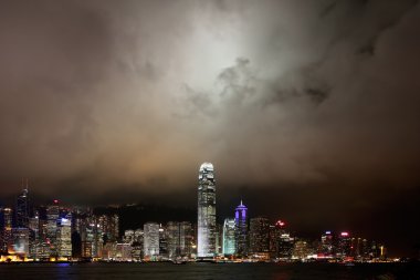Hong Kong Island skyline at night viewed from the Kowloon mainland clipart