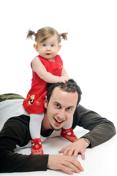Junger Vater spielt mit schöner Tochter — Stockfoto
